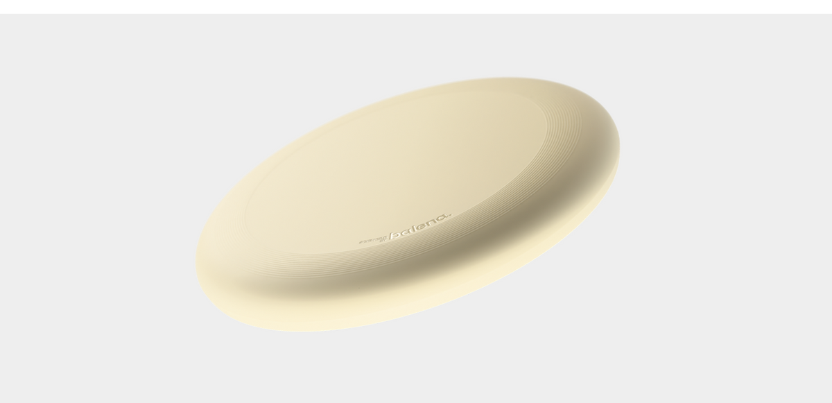 BioCirX frisbee on a soft neutral background